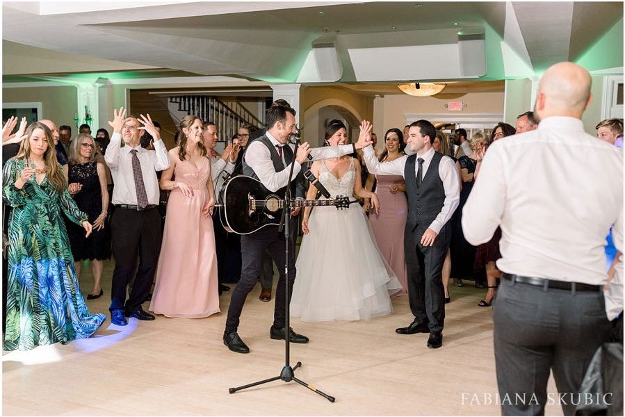 Jay singing on wedding