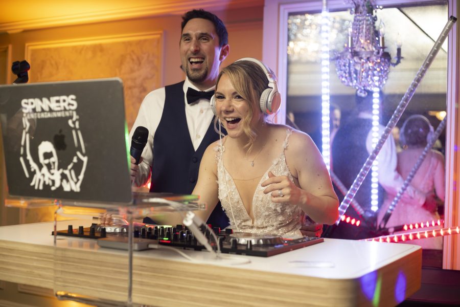 Bride and groom enjoying a wedding DJ performance with Spinners Entertainment